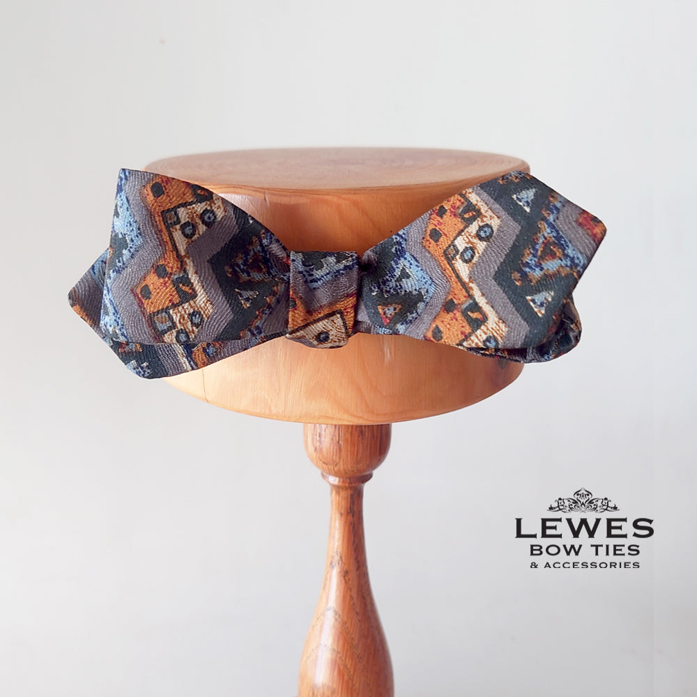 Vintage silk skinny bow tie in grey and orange graphic pattern