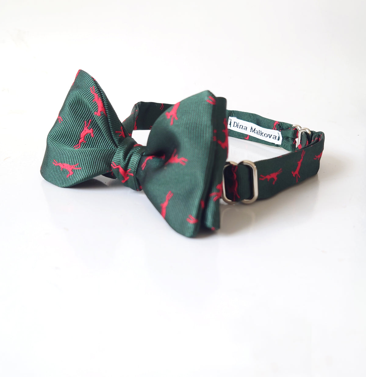 Dark green silk bow tie with hare print in red
