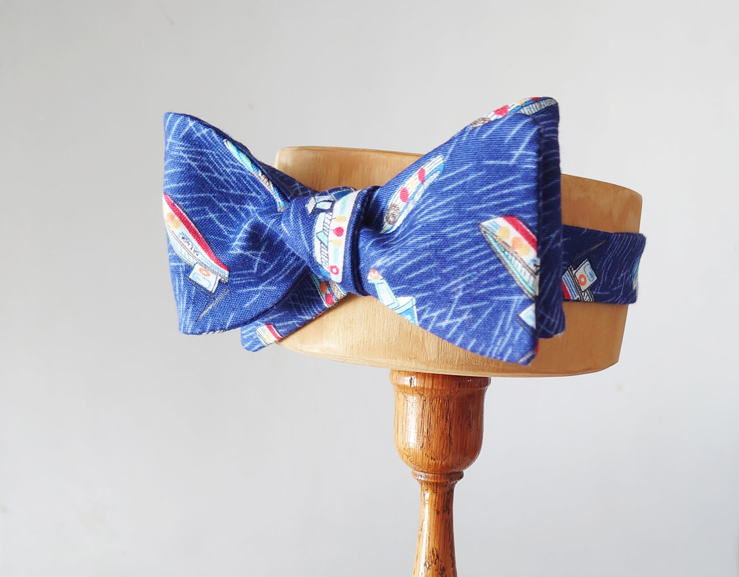 navy blue cotton self tie bow tie with boats print