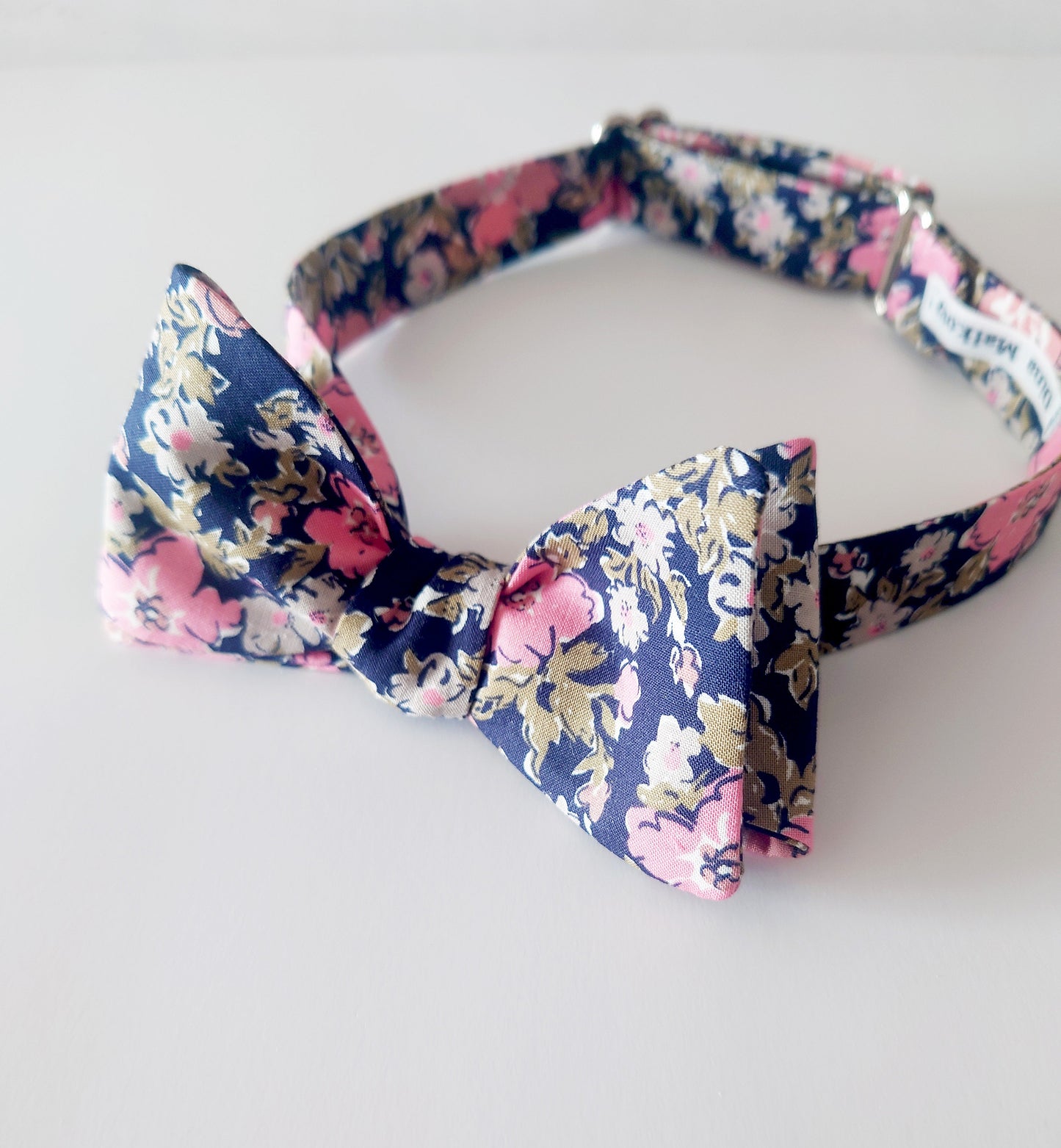 navy blue self tie bow tie with ;pink flowers