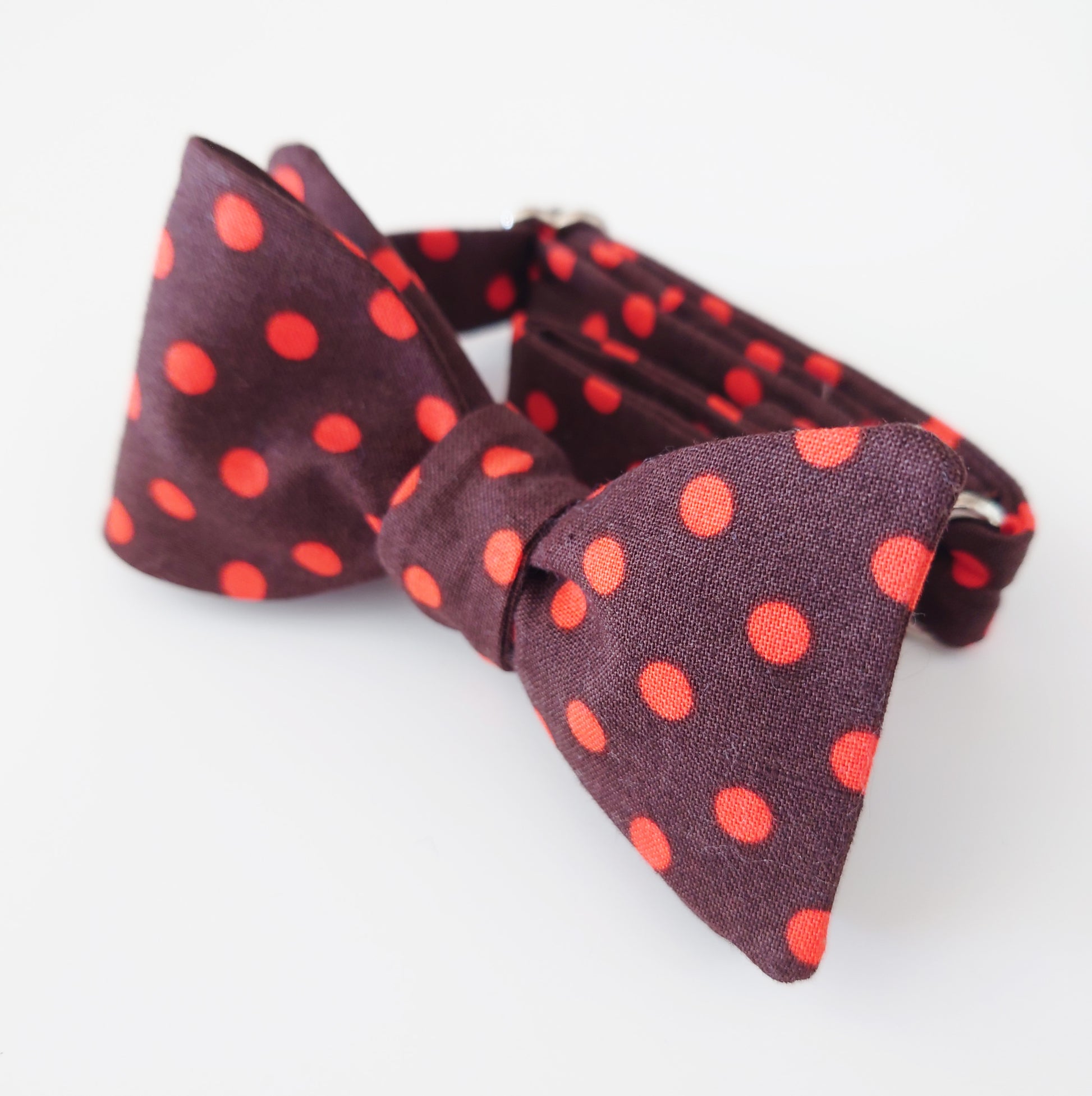 orange polka dot bow tie