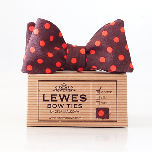 Bow tie with orange polka dots on a box 'Lewes Bow Ties' 
