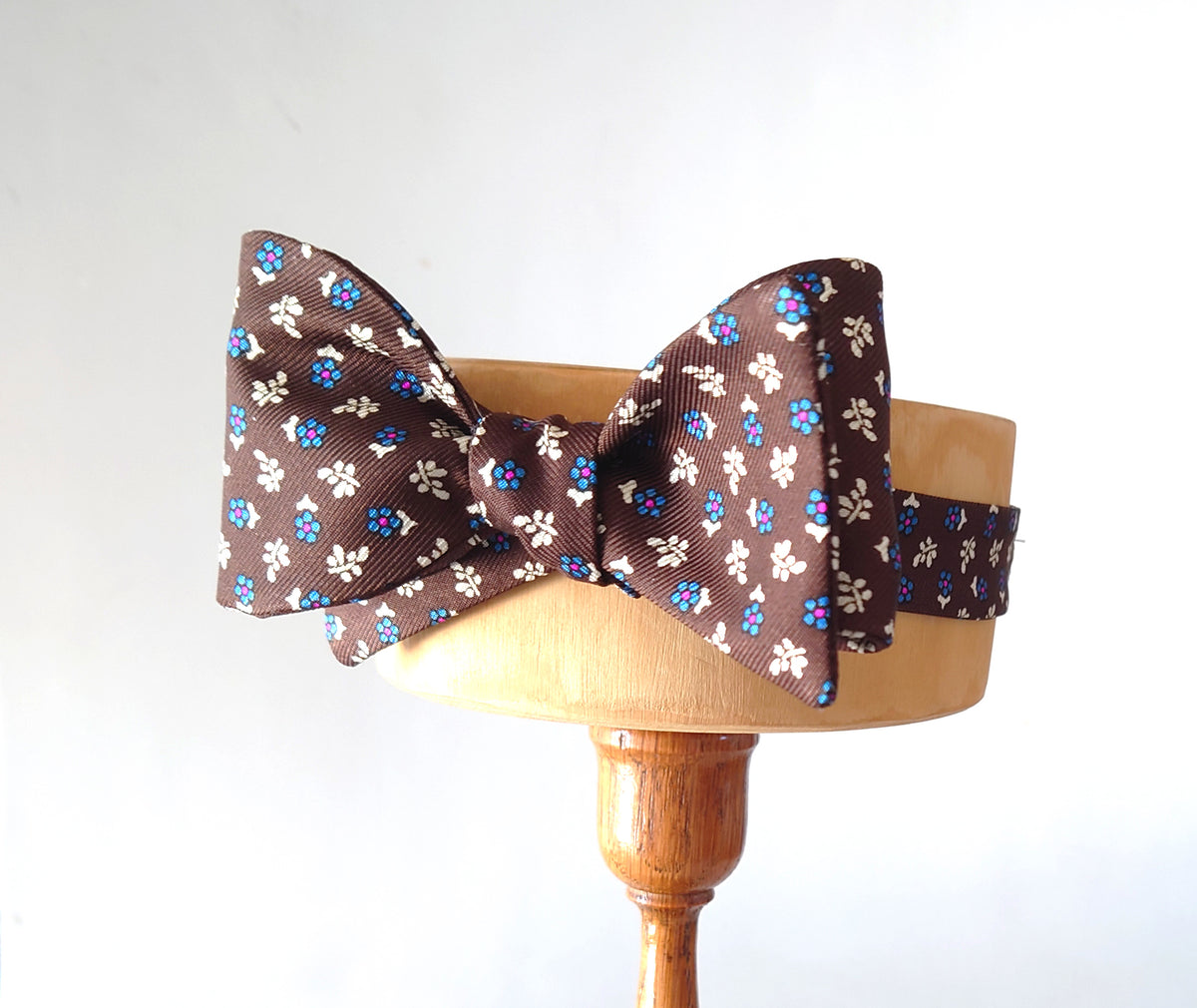 brown silk bow tie with blue daisies