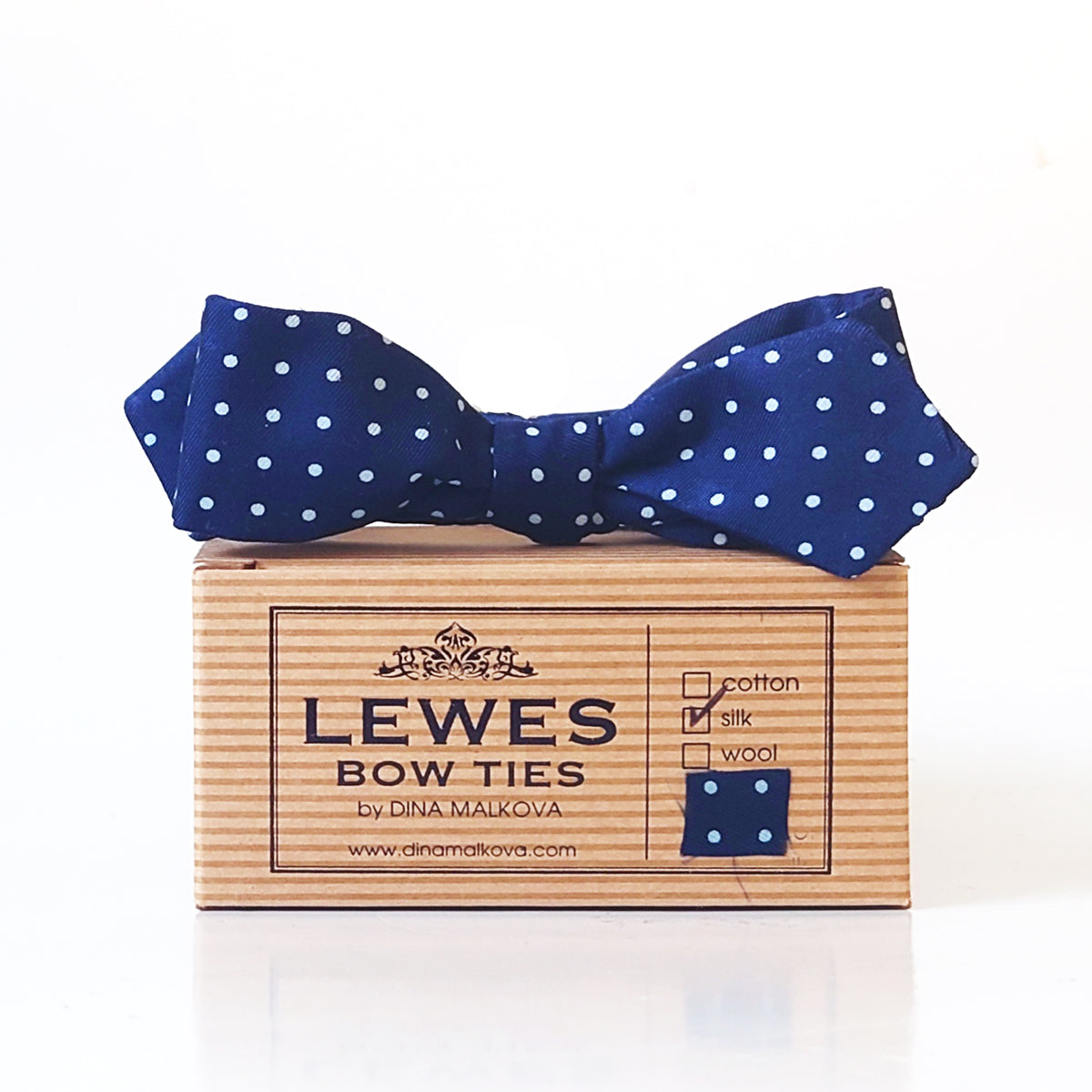 Navy blue polka dot bow tie