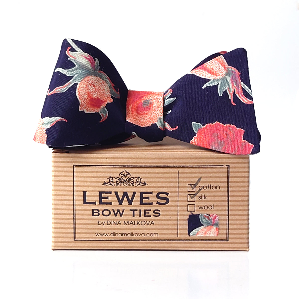 Peach and coral roses on navy blue bow tie