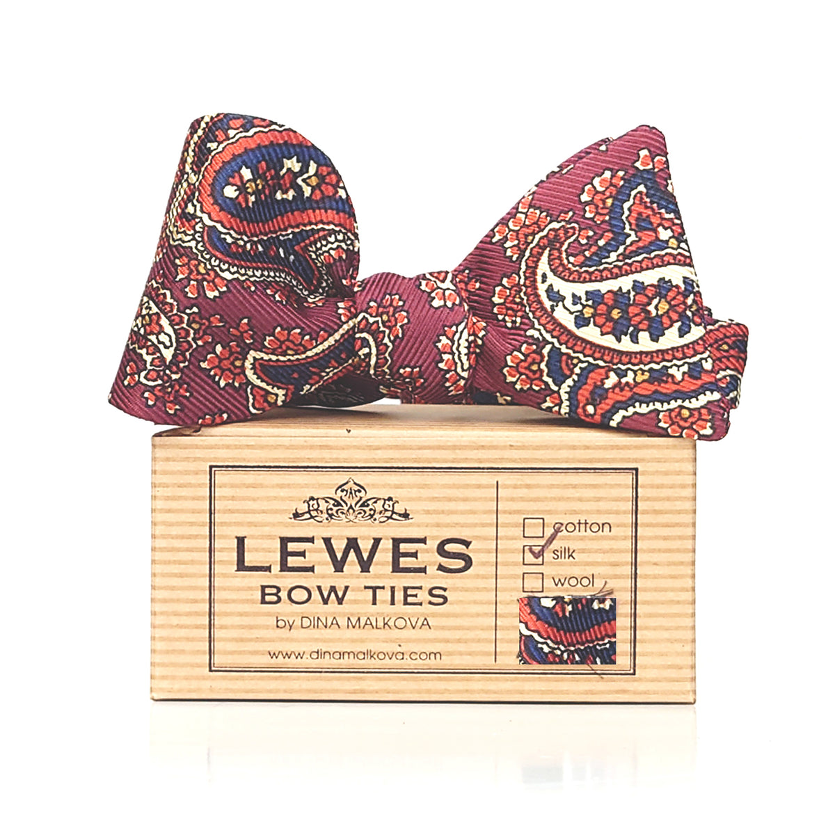 Silk paisley bow tie in rusty red, orange and navy blue