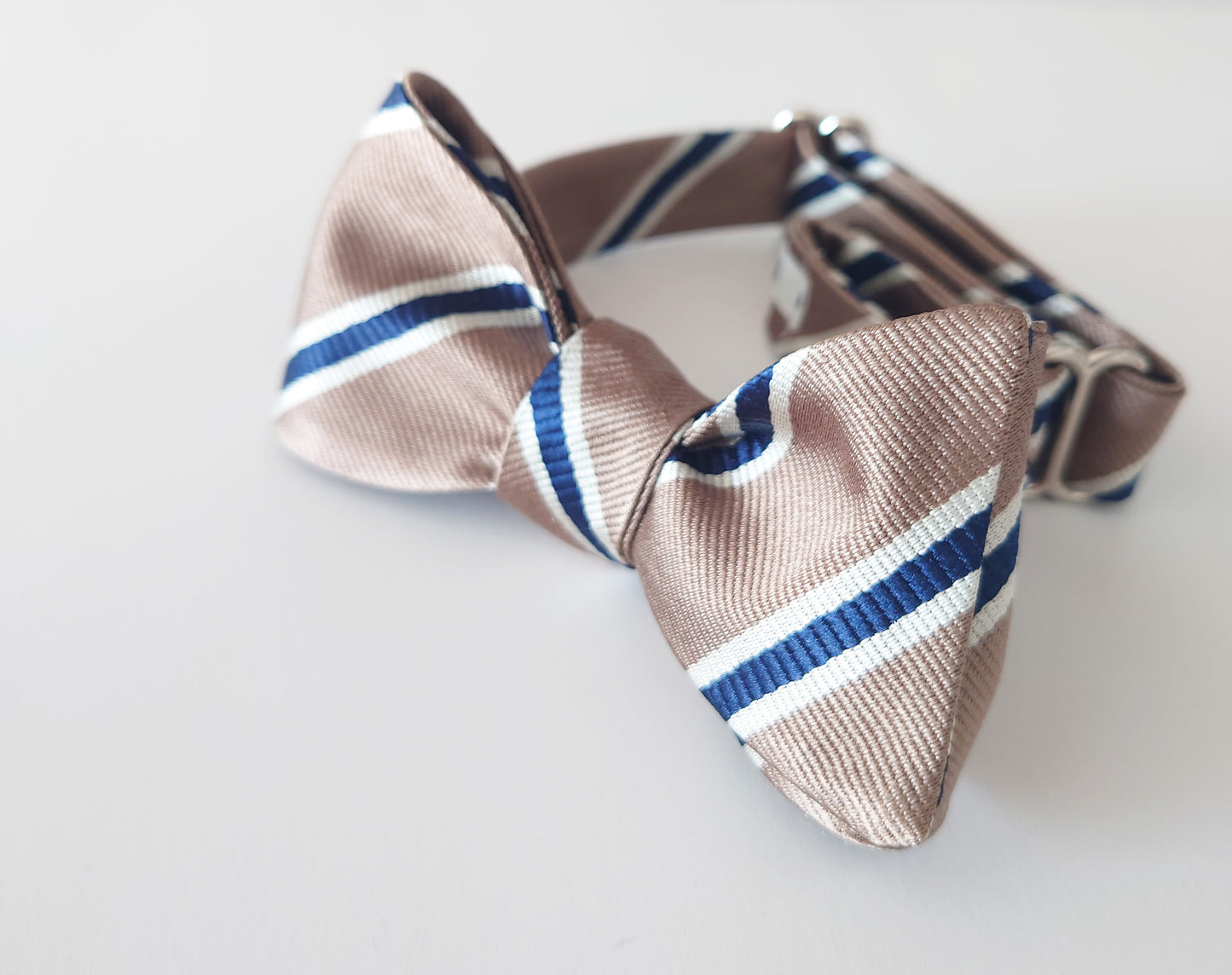 Taupe silk bow tie with navy stripes
